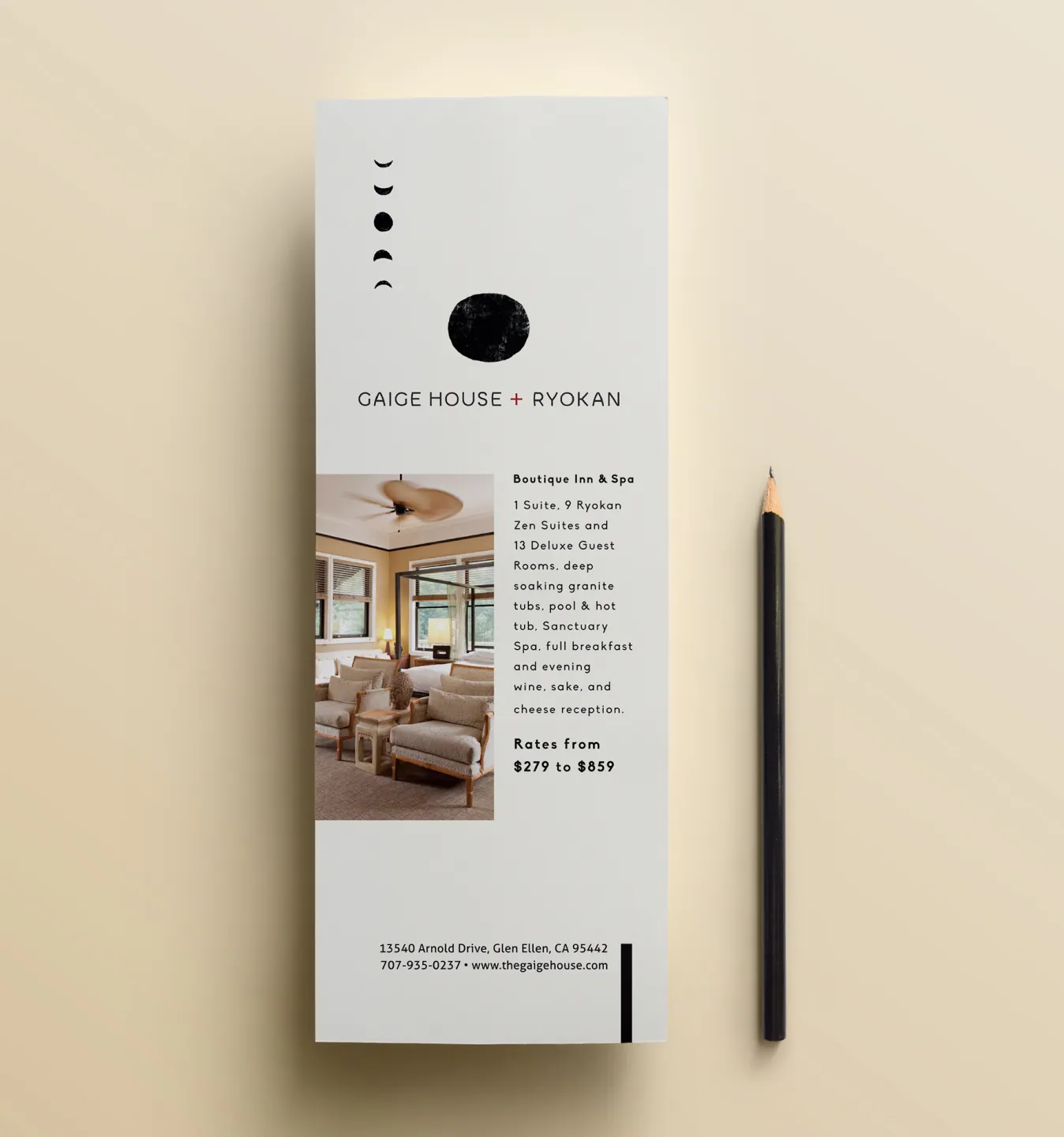 Gaige House and Ryokan rack card beside a pencil