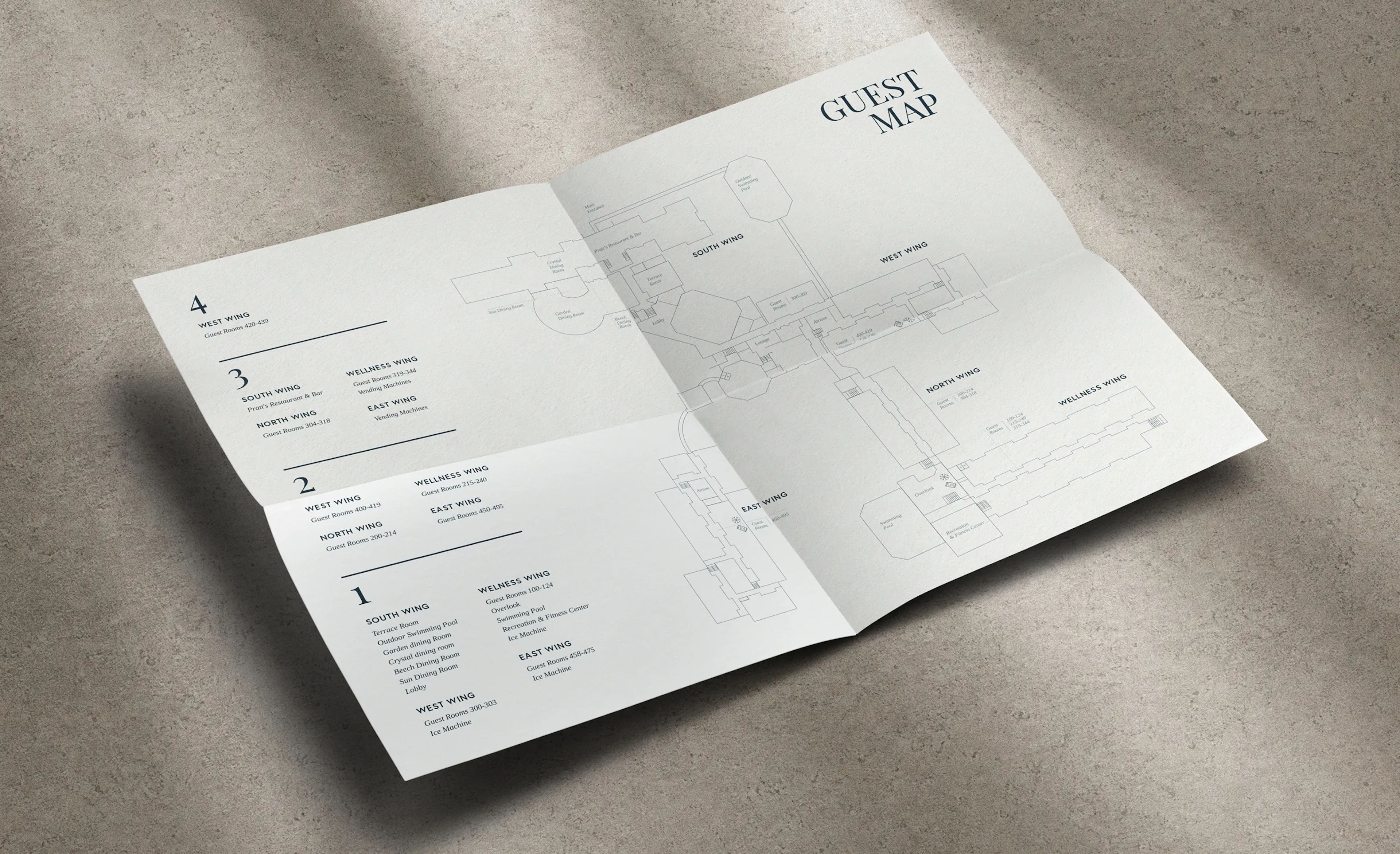 Folded paper guest map with hand-drawn illustrations