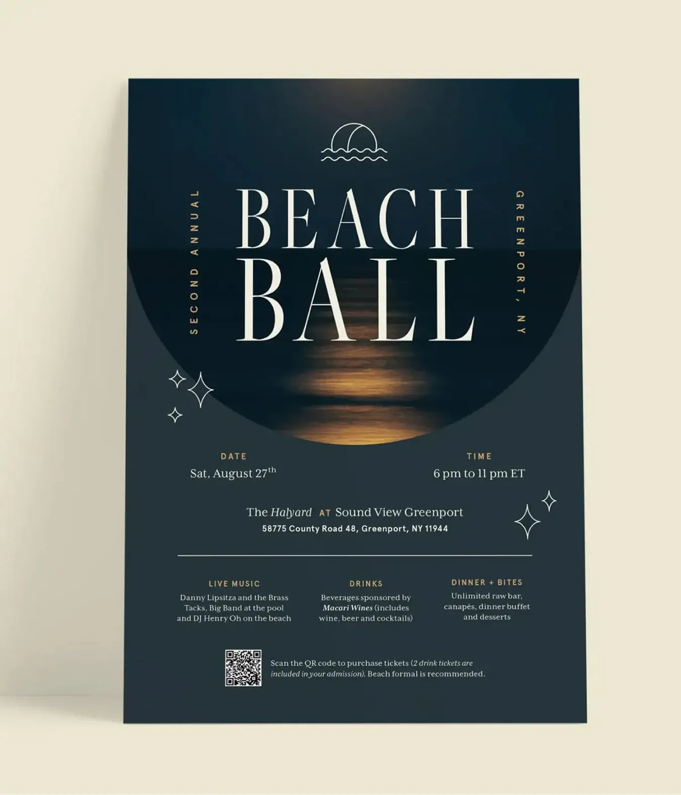 Beach Ball invitation card leaning against a wall