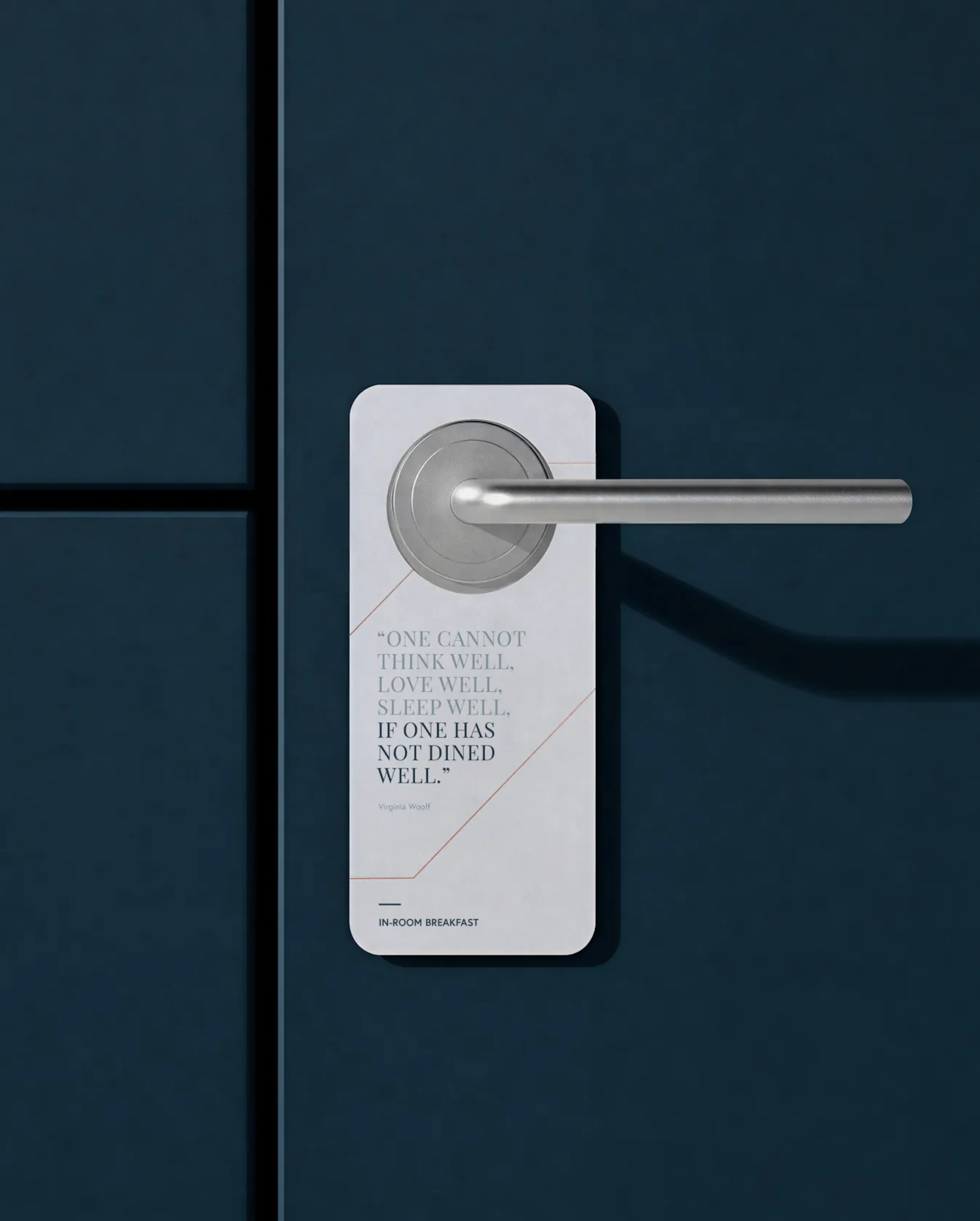 Door hanger with quote on a dark blue door beside the handle