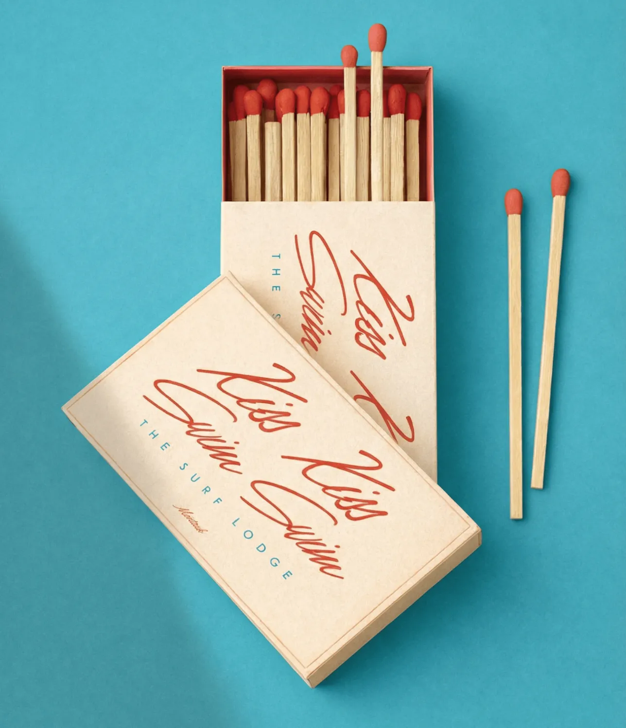 Match book with Surf Lodge branding on it.