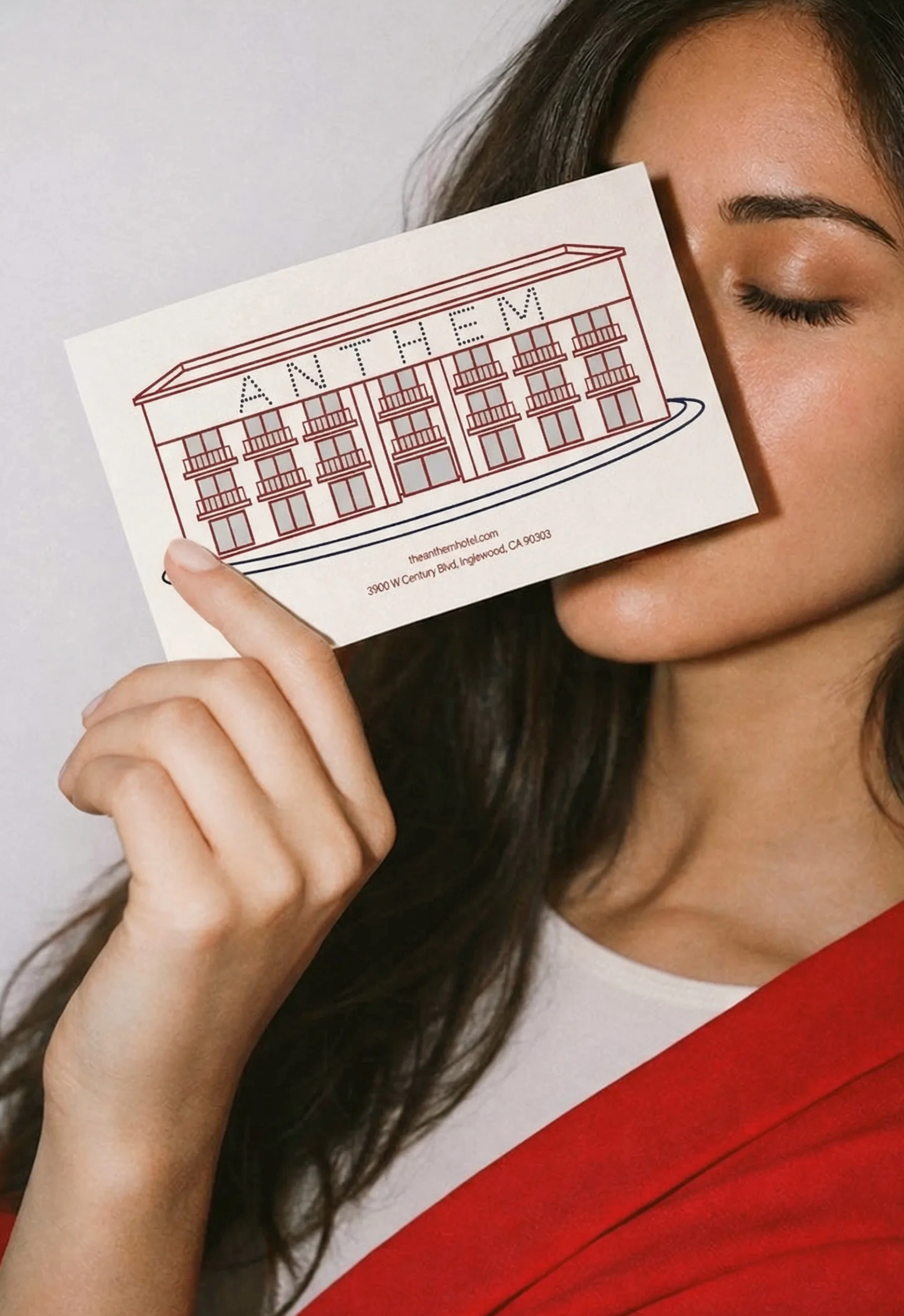 Image of a postcard with an illustration of the Anthem hotel on it.