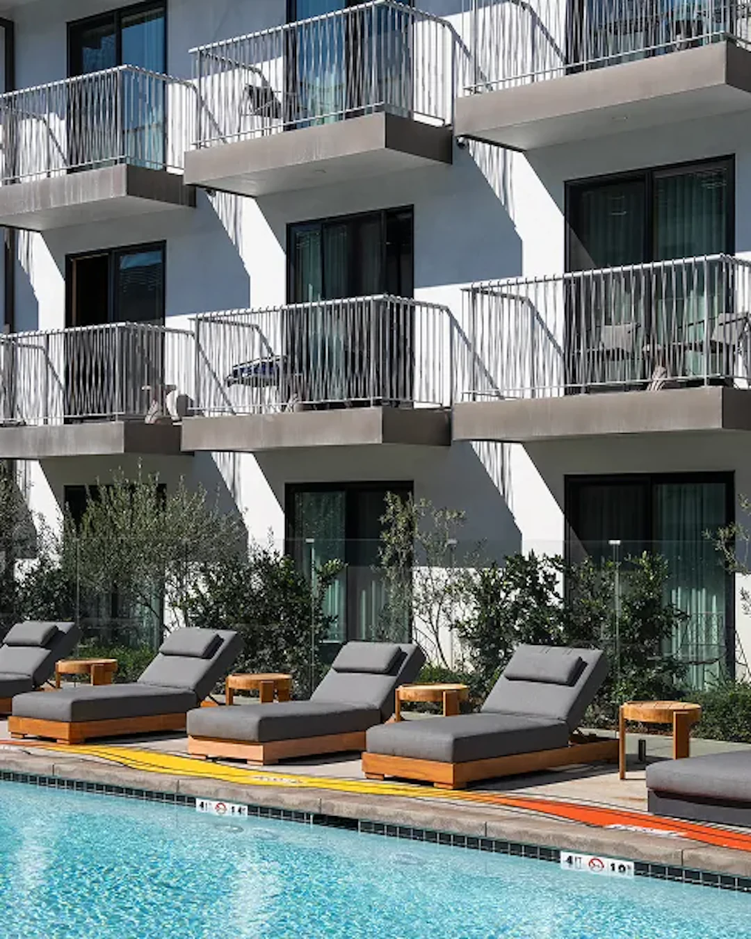 Apartment block beside a pool