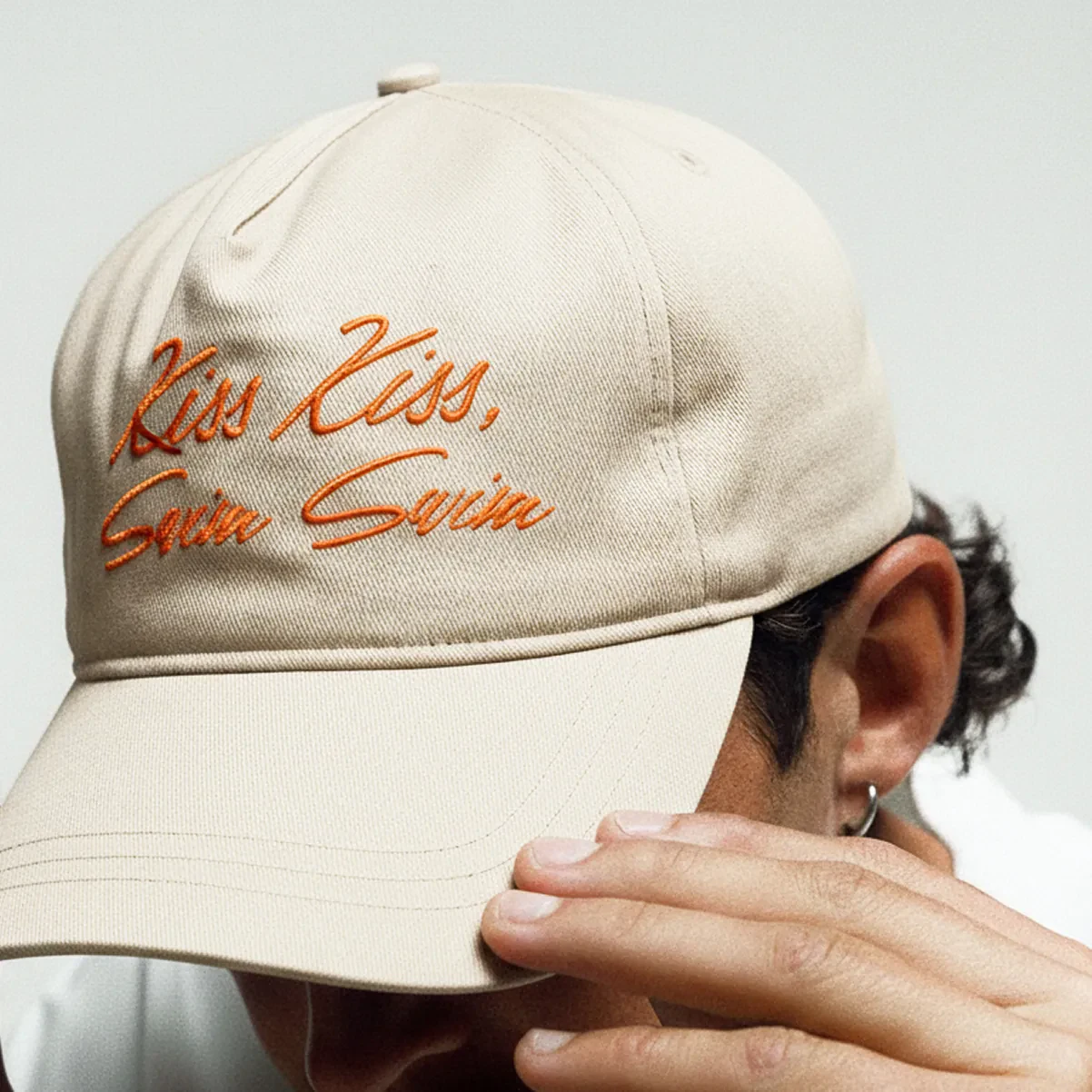 Person wearing a white hat
