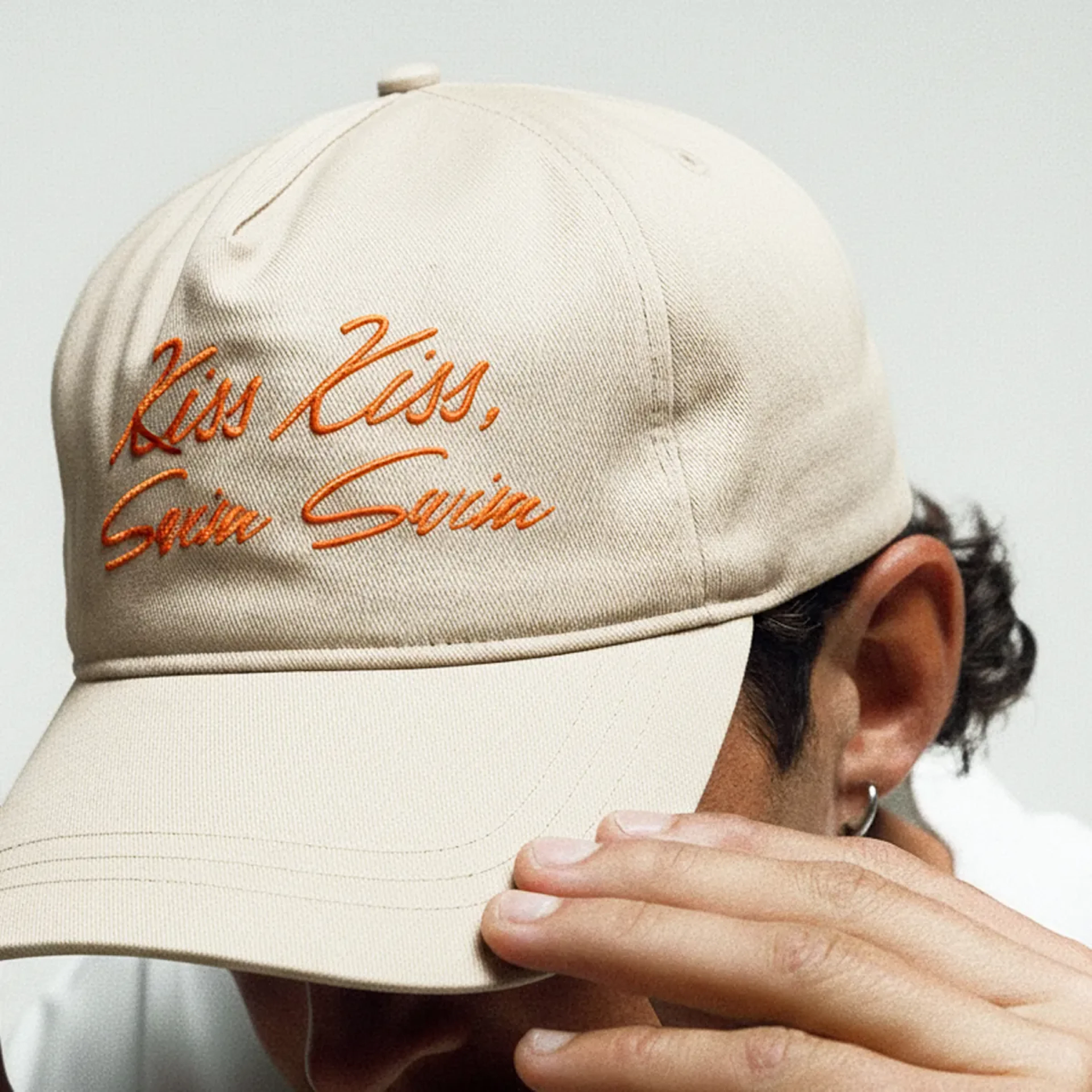 Person wearing a white hat