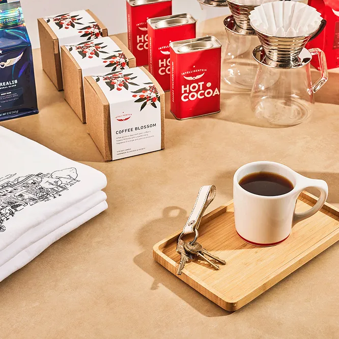 Coffee and coffee merch arranged on a table