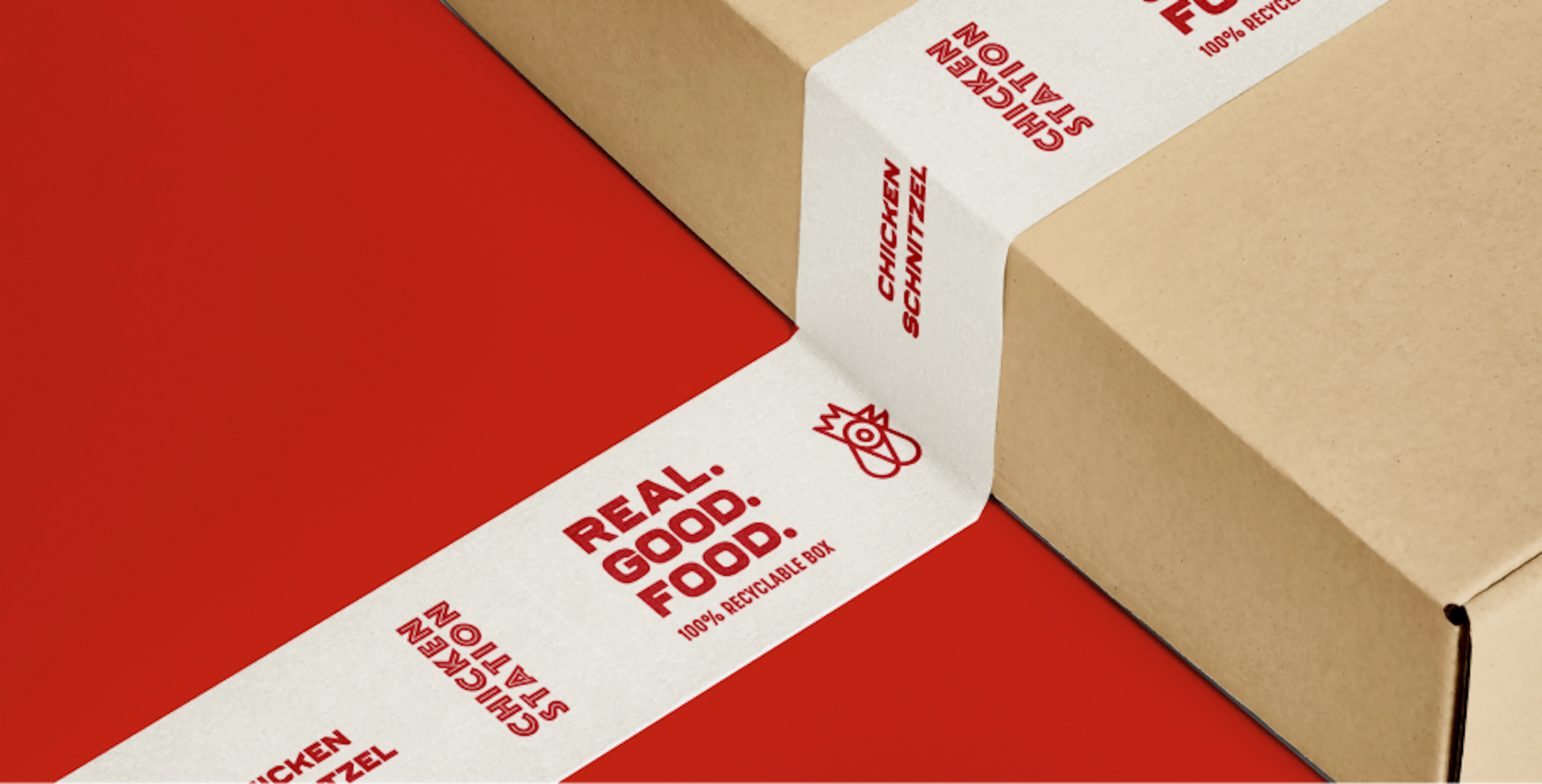 Cardboard box packaging design for Chicken station that also depicts white washi tape with branded Chicken Station elements like their tagline and logo in red