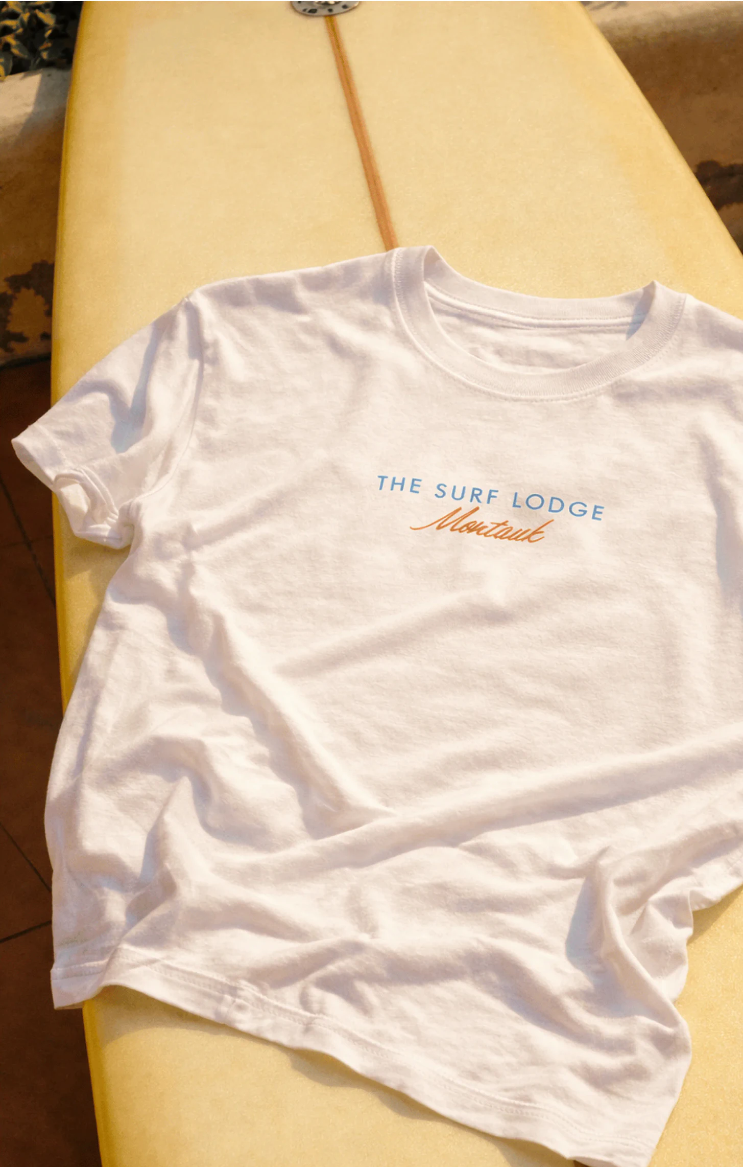 Shirt on a surfboard.