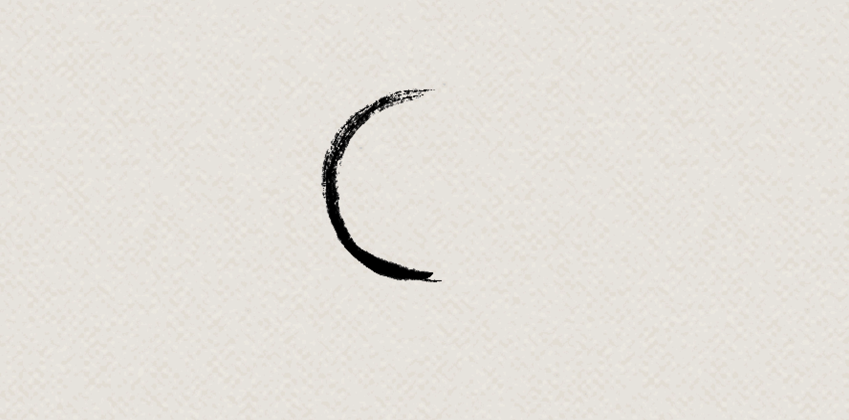 Single curved brushstroke on cream paper