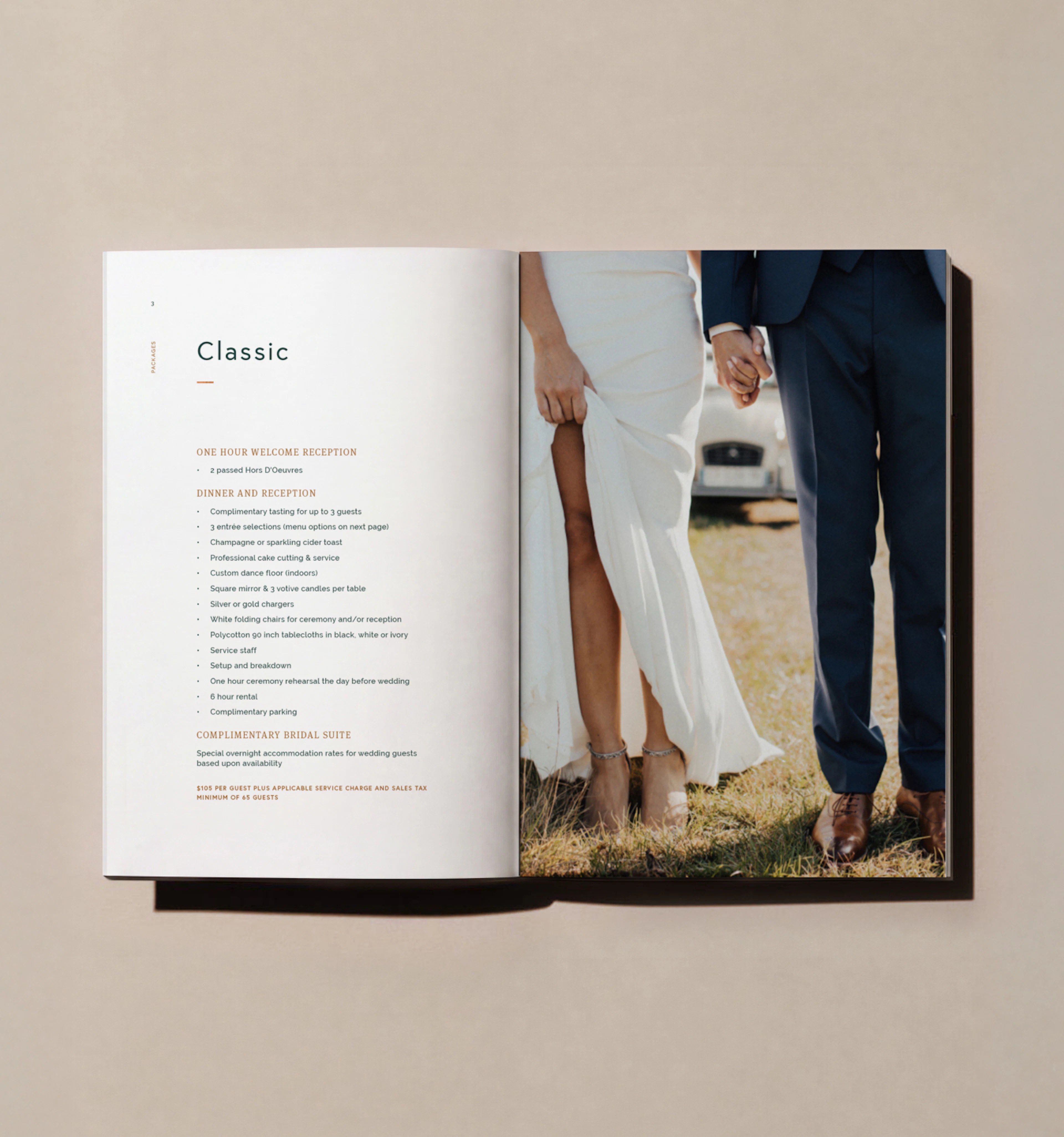 Open booklet spread with wedding text beside couple's legs on grass