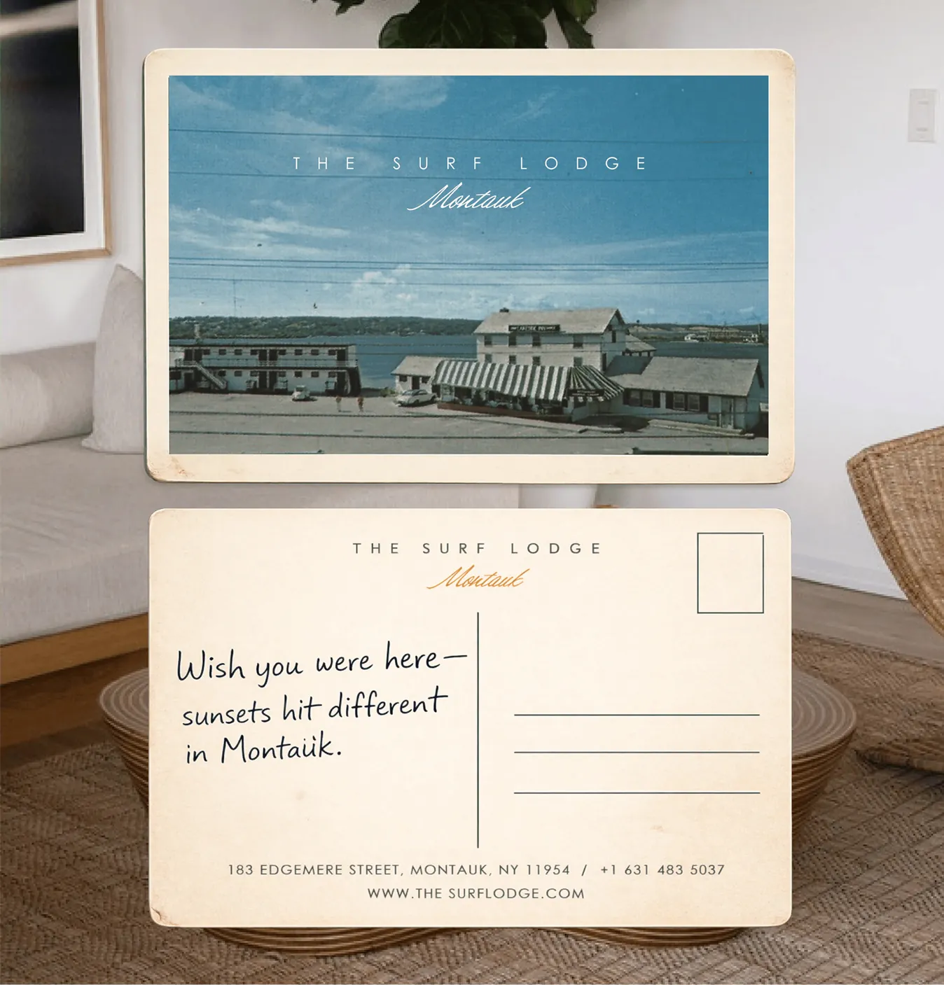 The Surf Lodge postcard, front and back, on a couch