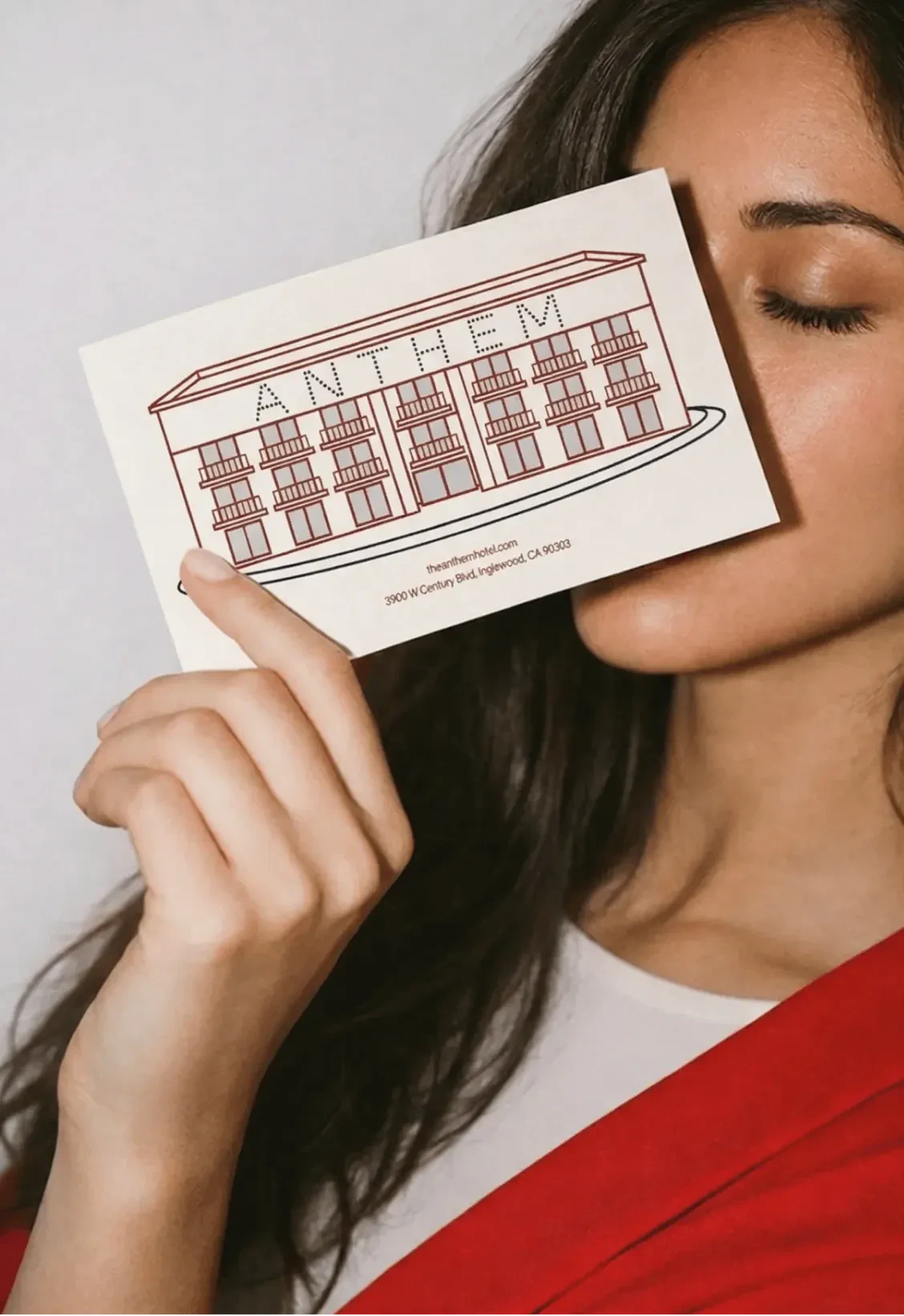 Image of a postcard with an illustration of the Anthem hotel on it.