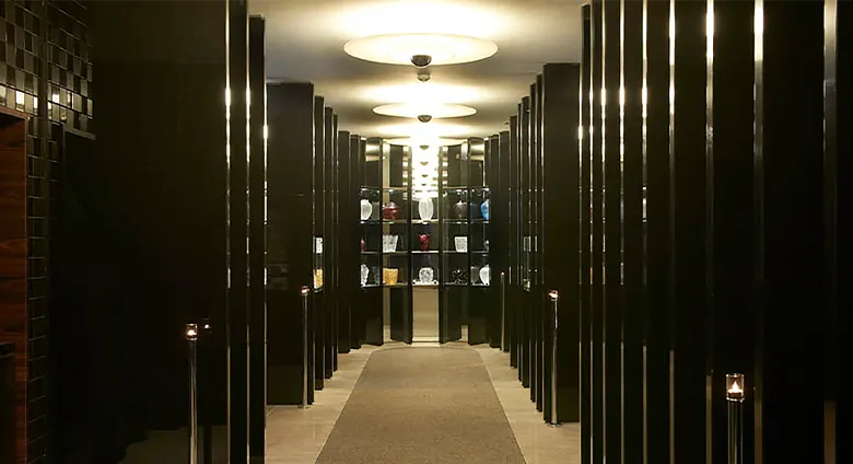 Corridor with display case.