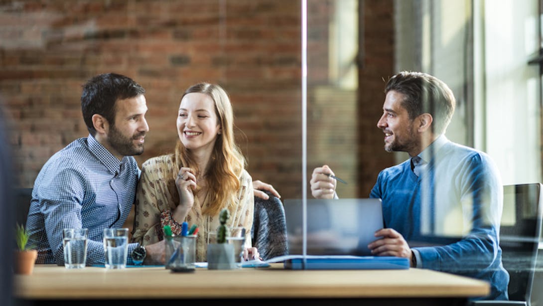 Three person in professional meeting