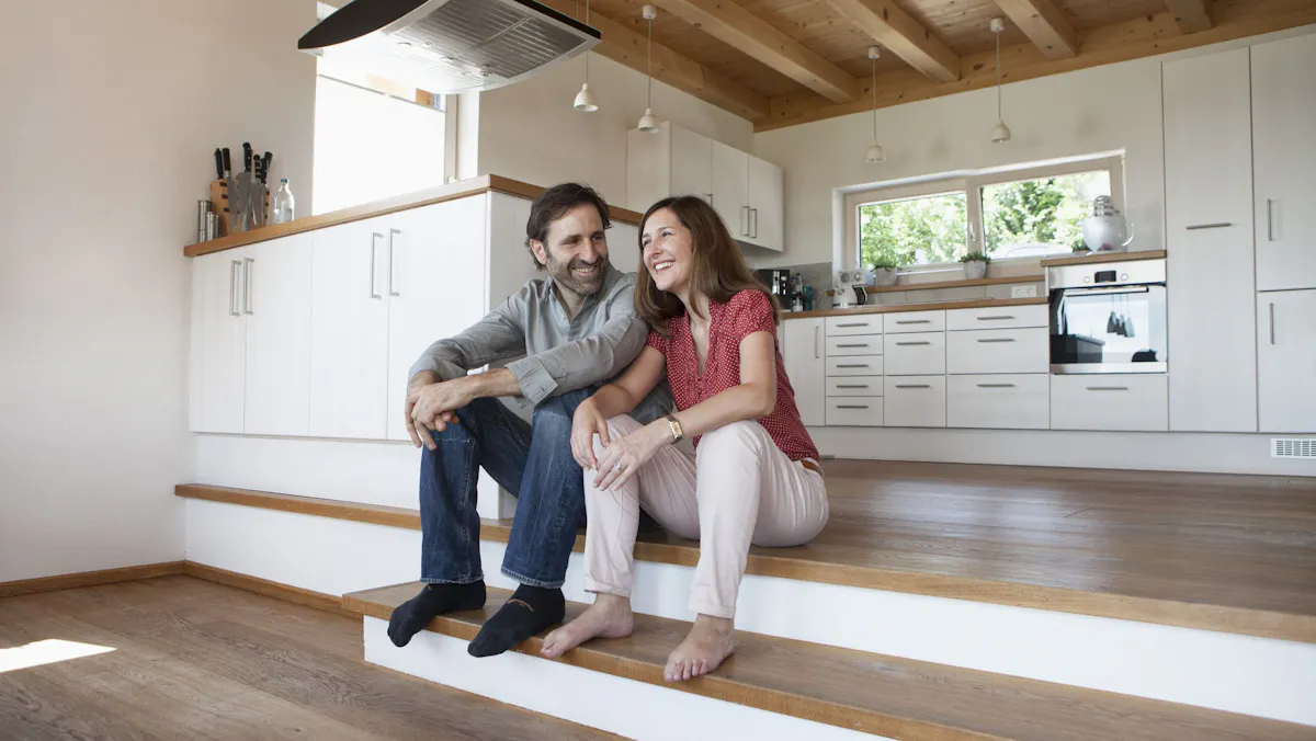 couple in a kitchen couple in a kitchen