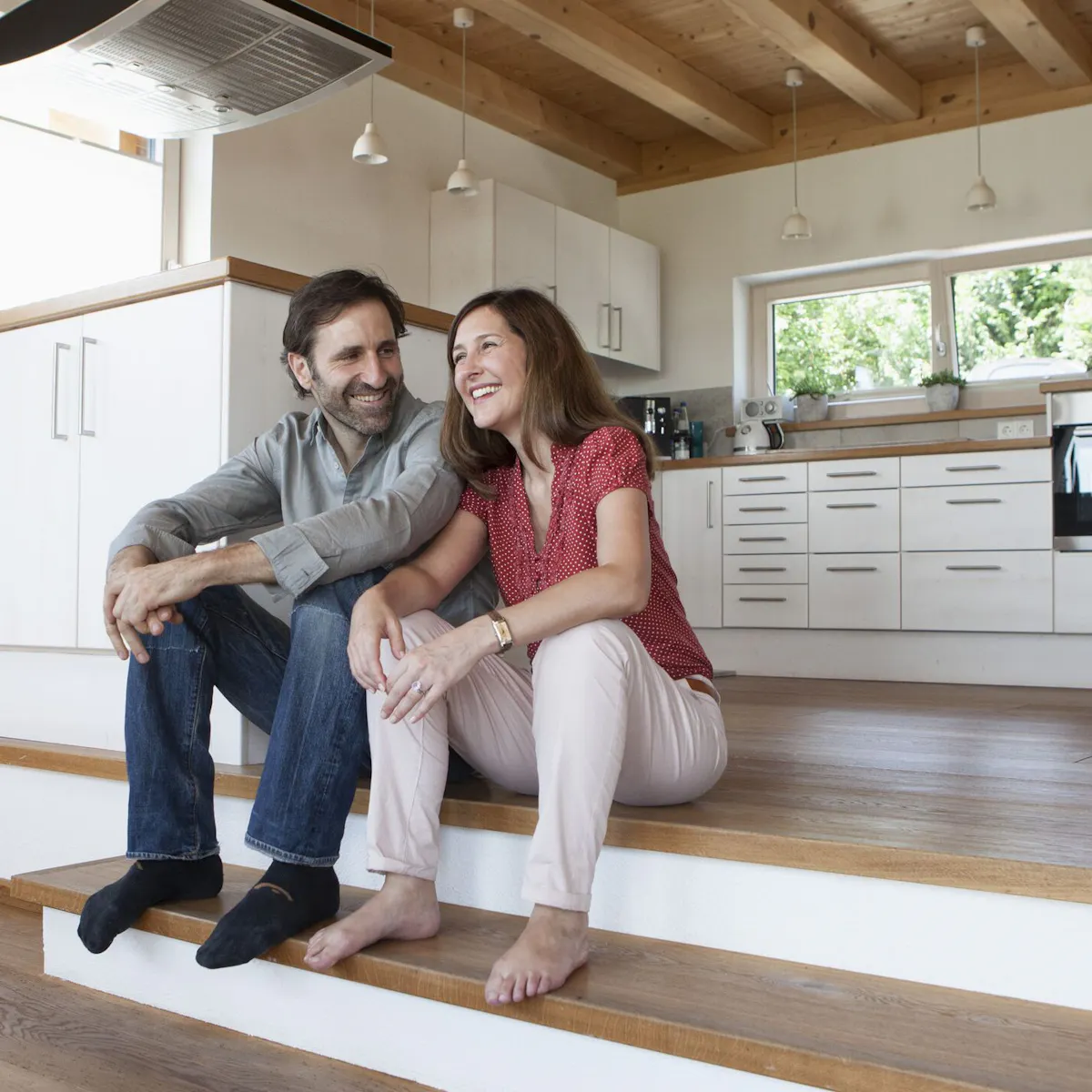 couple in a kitchen couple in a kitchen