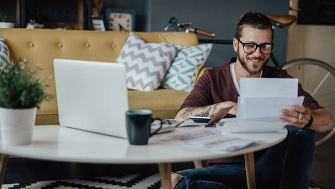 Man manages administrative papers Man manages administrative papers