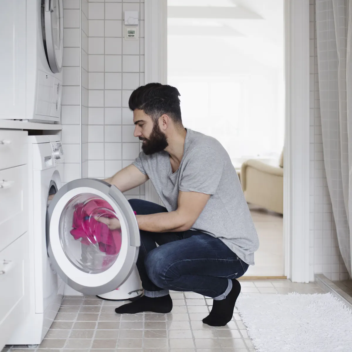 man in the laundry room man in the laundry room