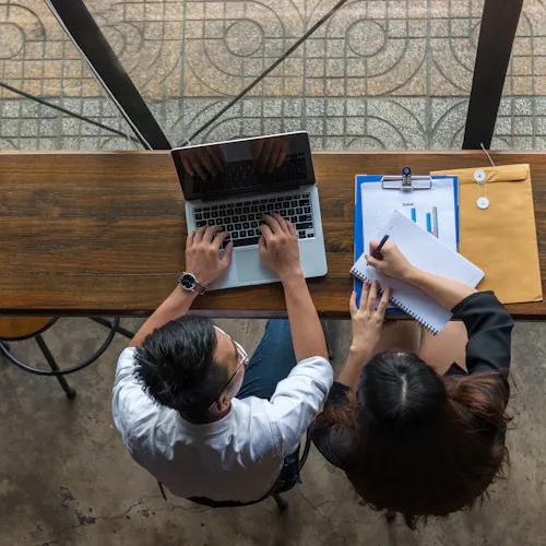 man and woman working man and woman working