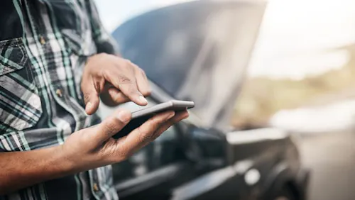 man with broken down car man with broken down car