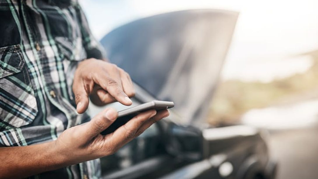 man with broken down car man with broken down car