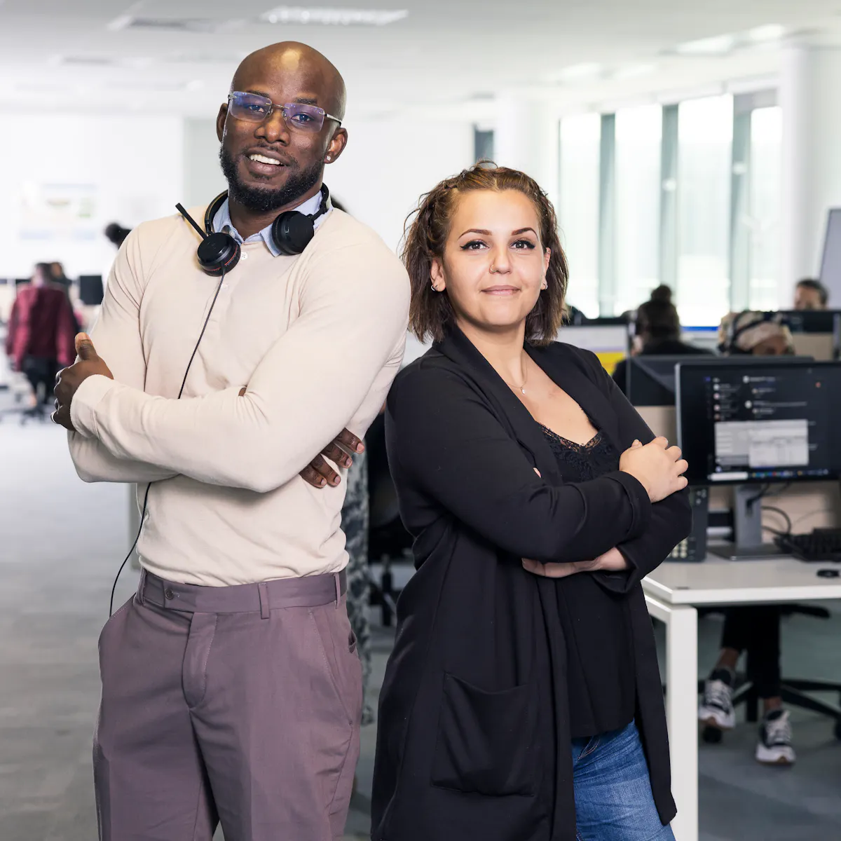 two people standing in the office two people standing in the office