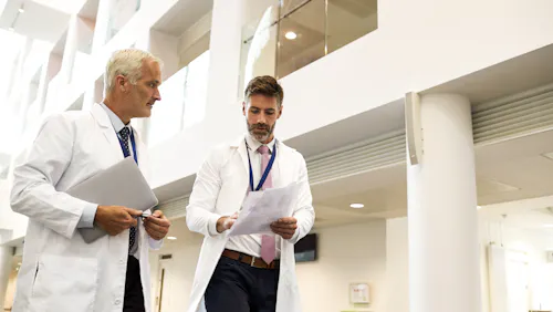 doctors walking in hospital doctors walking in hospital