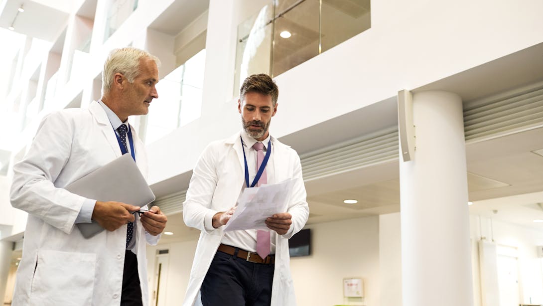 doctors walking in hospital doctors walking in hospital