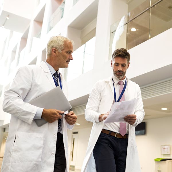 Doctors walking in hospital