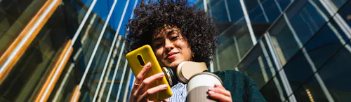 a lady using a cell phone a lady using a cell phone