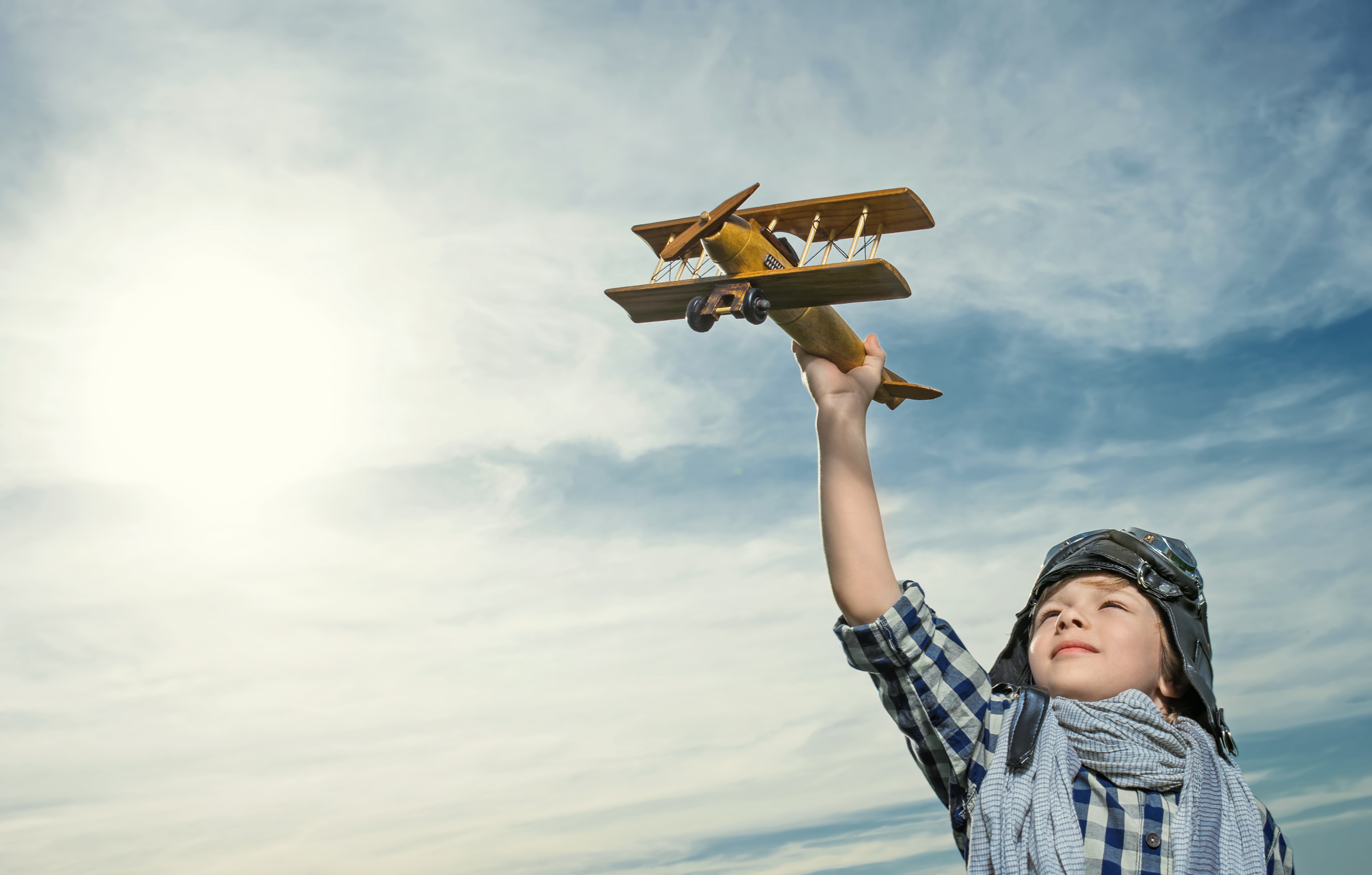 little boy playing with aircraft
