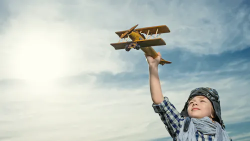 little boy playing with aircraft little boy playing with aircraft