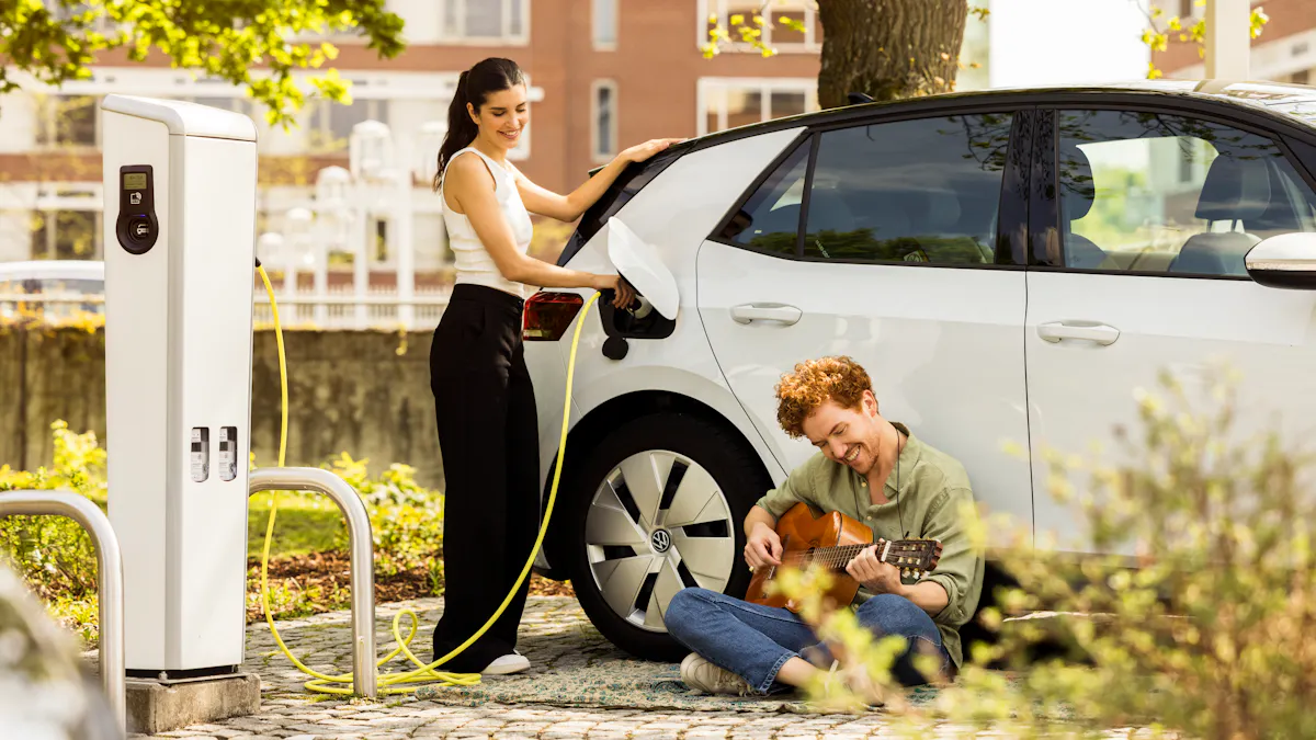 couple charging their electric vehicle