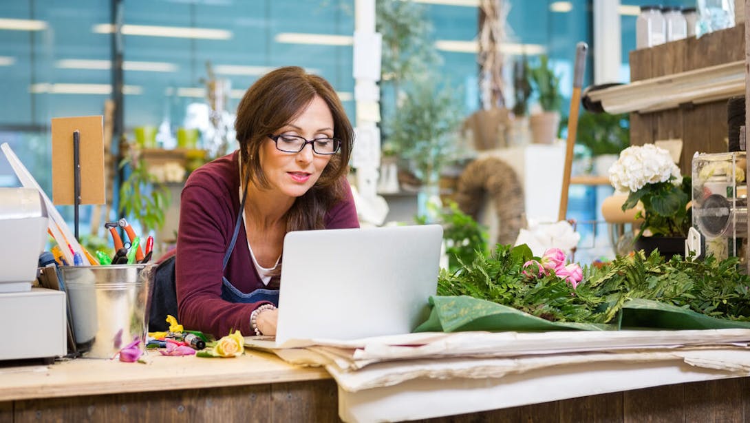 Woman in her plant shop Woman in her plant shop