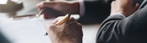 two person signs a contract two person signs a contract