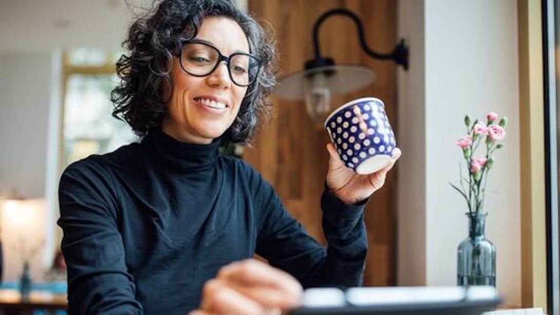 Woman drinks coffee