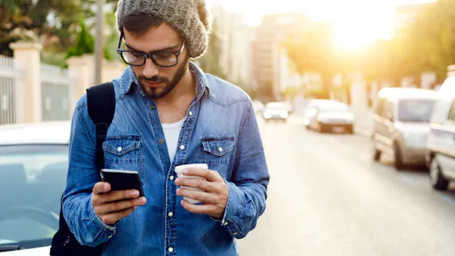man with phone and coffe man with phone and coffe