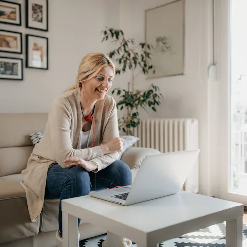 woman in front of computer at home woman in front of computer at home