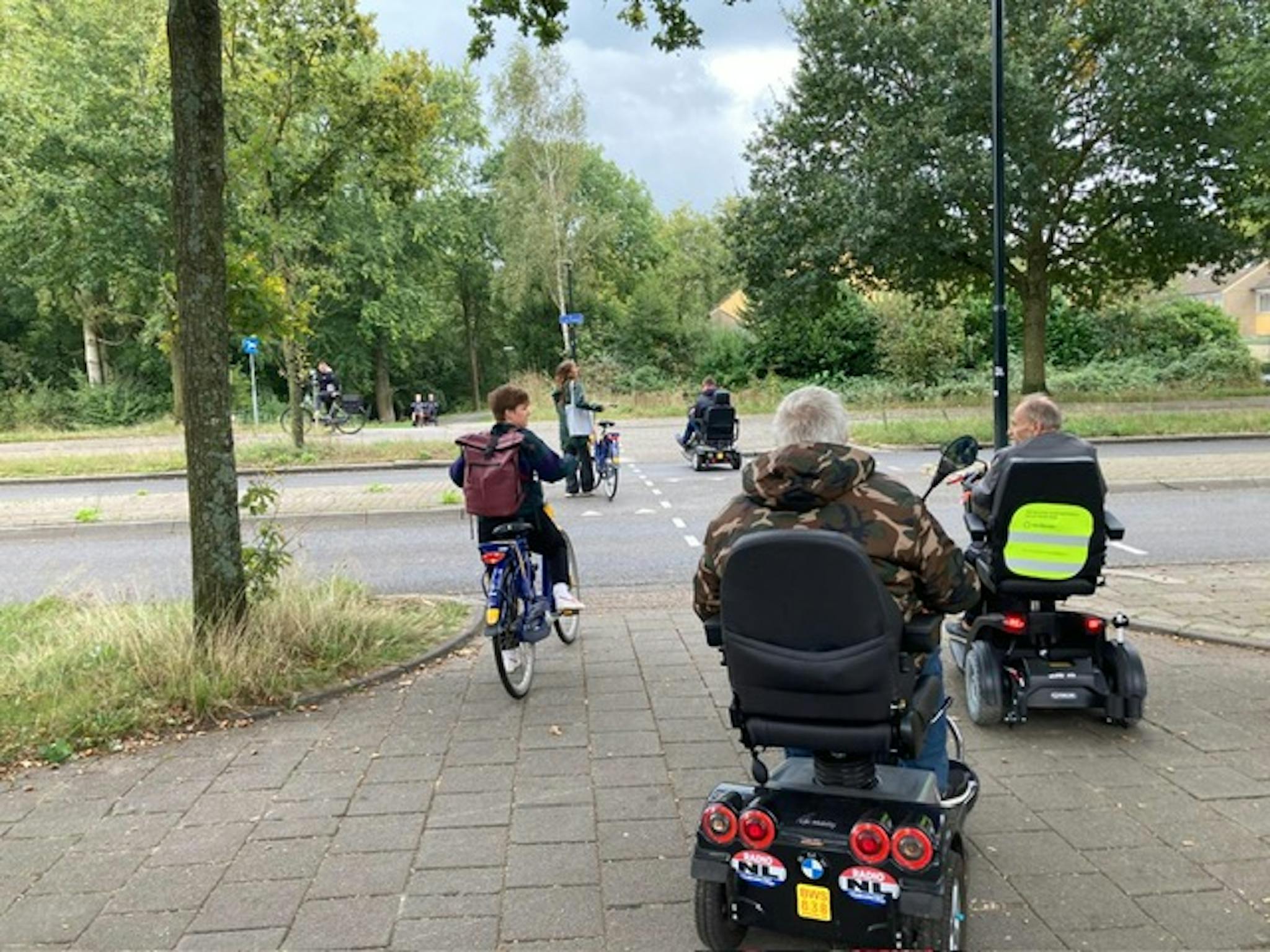 overstekende scootmobiels