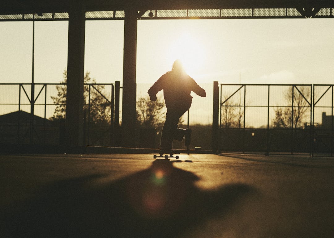 Skateboarding into the sunset