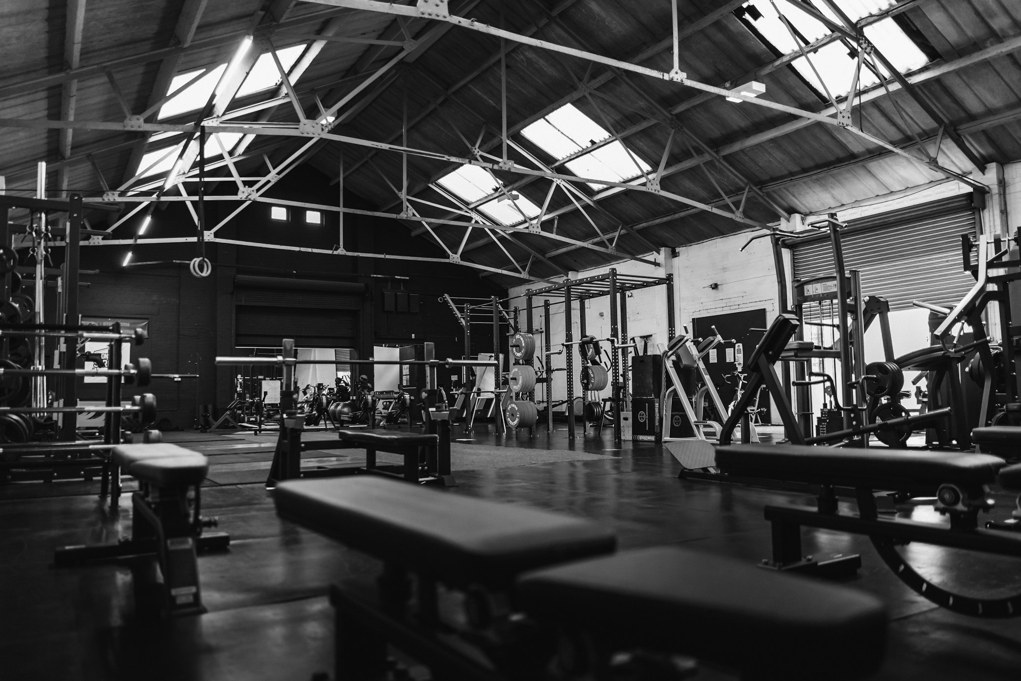 Indoor community sports hall with high ceilings and equipment for multi-sport programmes and activities