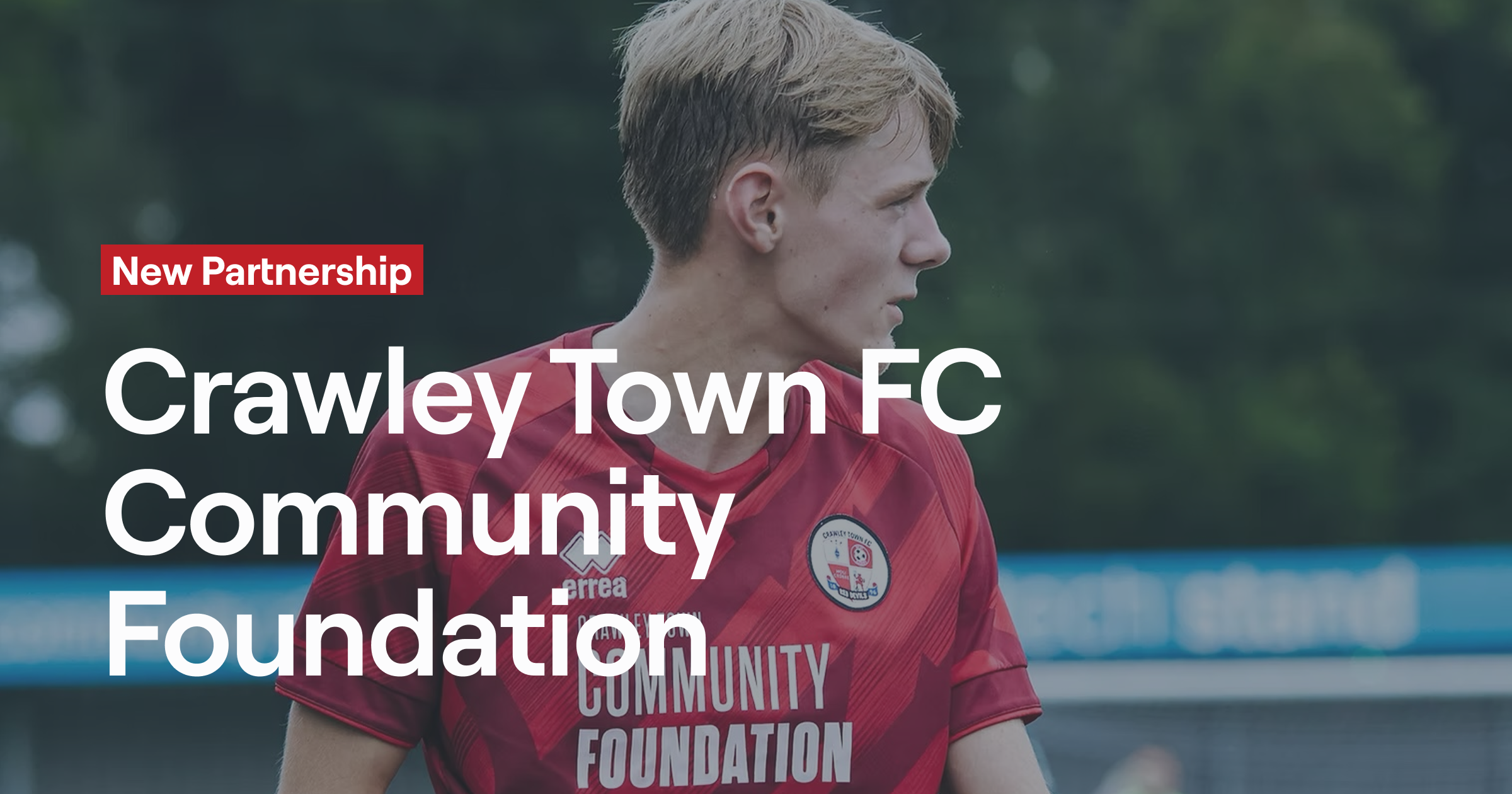 Young footballer wearing Crawley Town FC Community Foundation jersey - Abler partnership announcement
