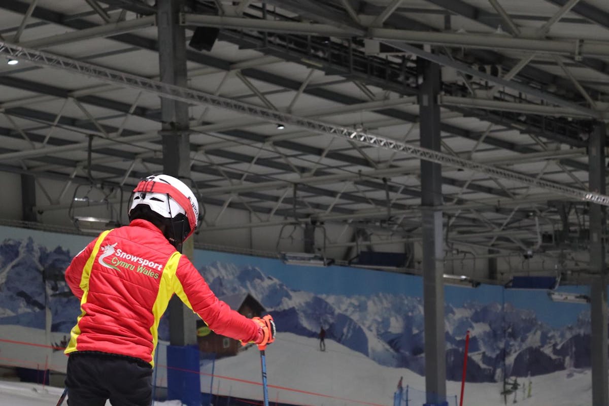 Snowsport Wales athletes training on indoor slope with coaching support from national pathway programme