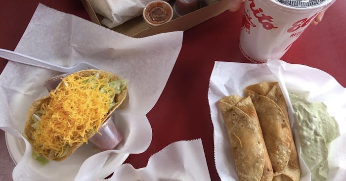 Rolled tacos with guac and hard shell beef taco 