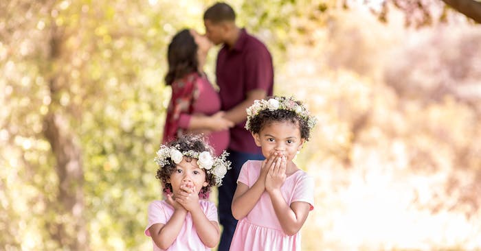 Picture of family of four by Nicole Kahn Photography