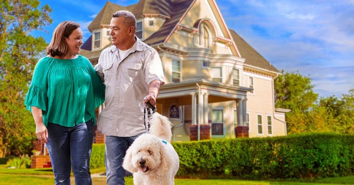 Couple walking dog in Redlands California