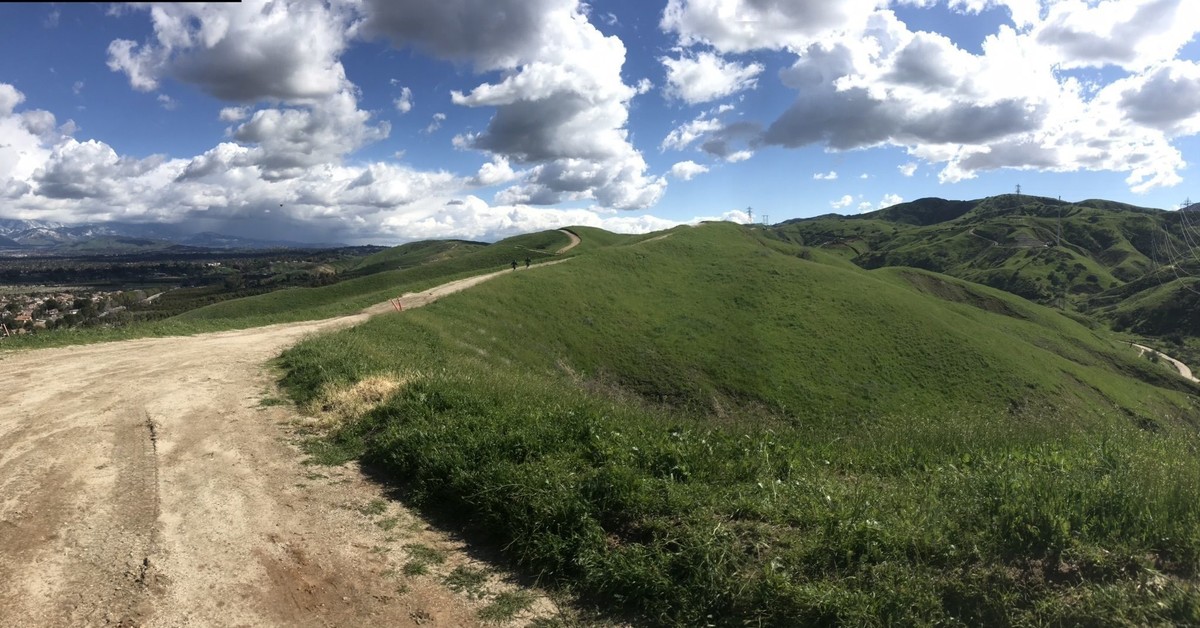 Green trail and blue sky