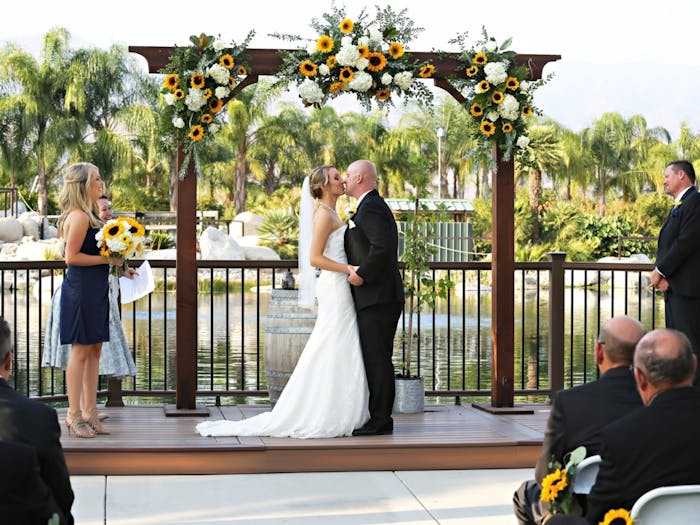 Dramatic, rustic ceremony decor by Hockridge Florist