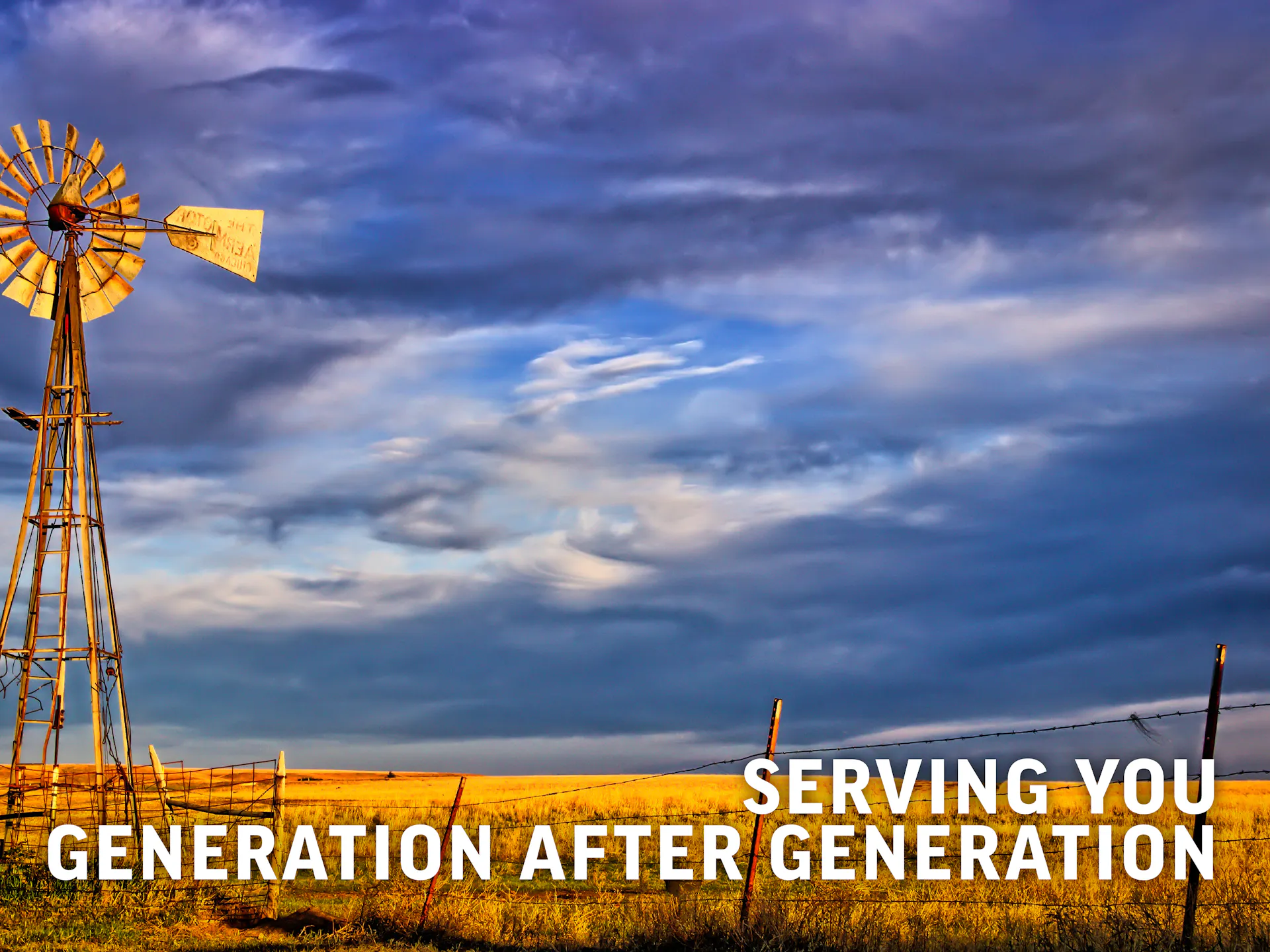 Field with wind mill in background, typography reads "serving you generation after generation"