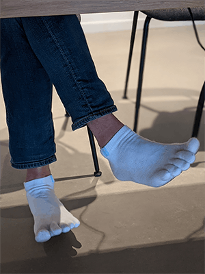 Casper's feet while being interviewed for The Healthtech Podcast with Dr. James Somauroo